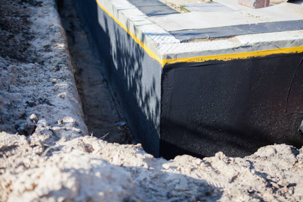 Professional Waterproofing technician working in Conover, OH
